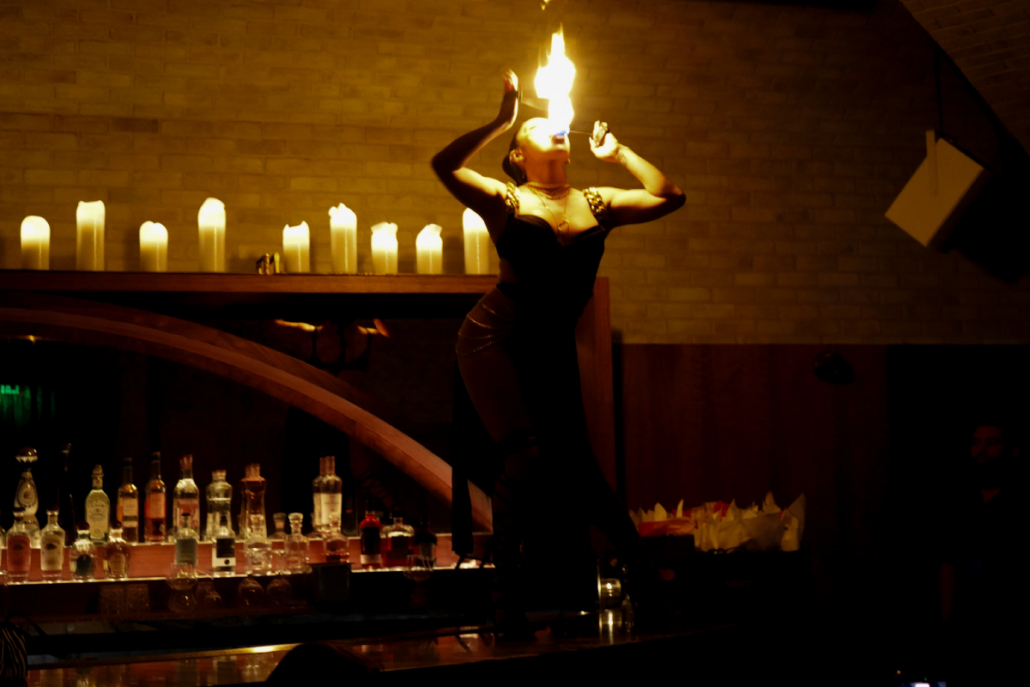 A fire dancer performs at Toca Madera. A fire dancer performs at Toca Madera.