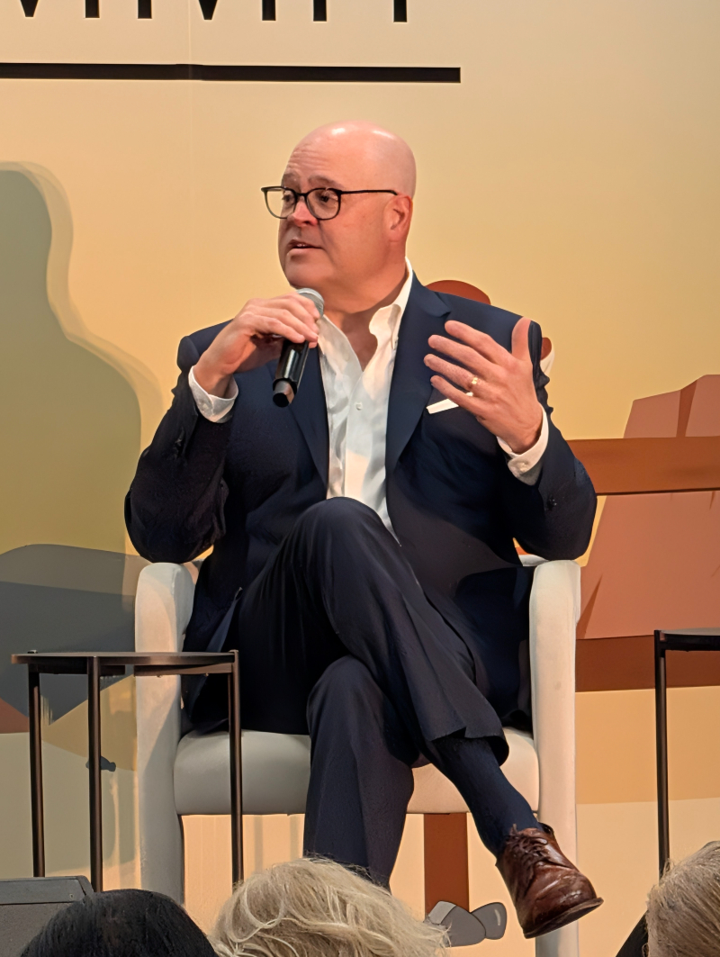 Patrick Walsh, COO of KnitWell Group, is interviewed by Sonia Lapinsky, Partner and Head of Fashion Retail at AlixPartners, at The Lead Summit in Manhattan, May 20, 2026.